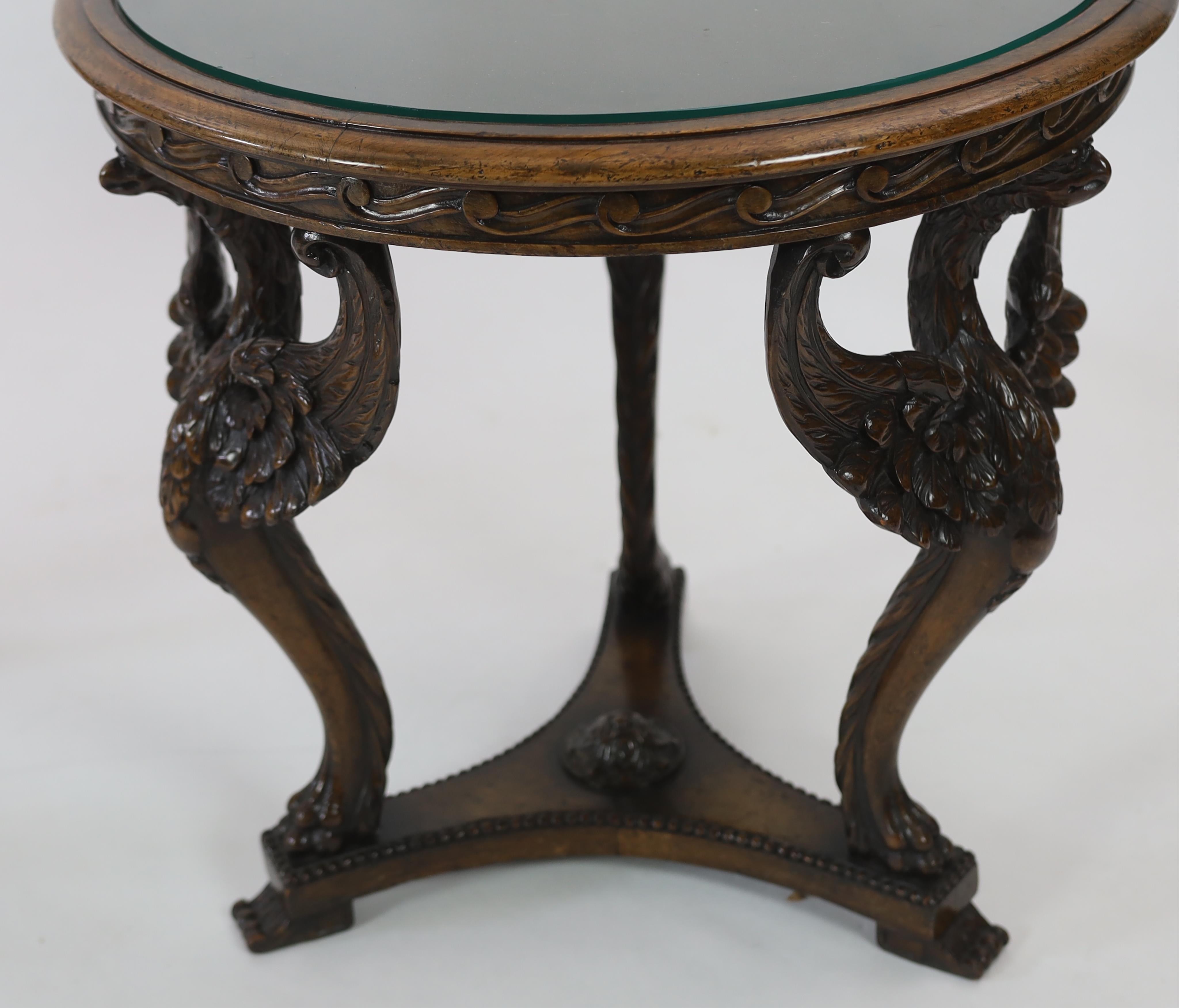 A pair of walnut occasional tables